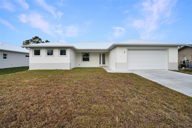 ranch-style home featuring a garage and a front lawn