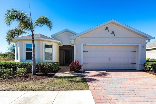 single story home with a garage