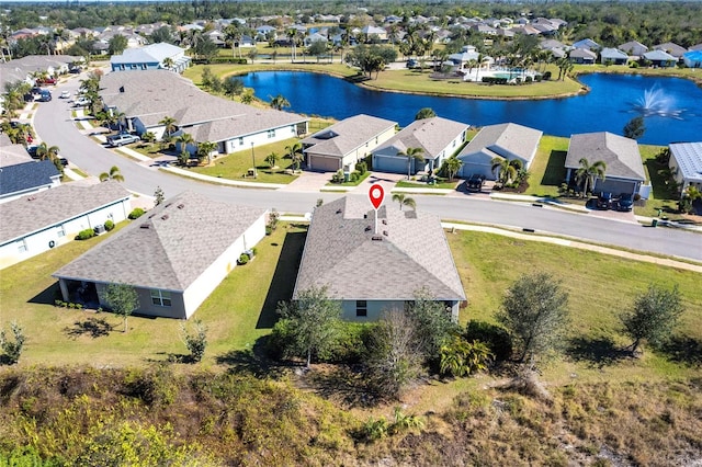 drone / aerial view with a water view