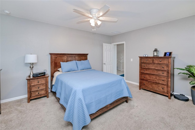 bedroom featuring ceiling fan and light colored carpet