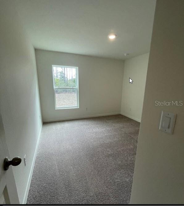 view of carpeted empty room