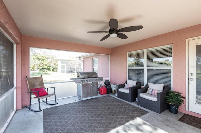 view of patio featuring area for grilling, an outdoor hangout area, and ceiling fan