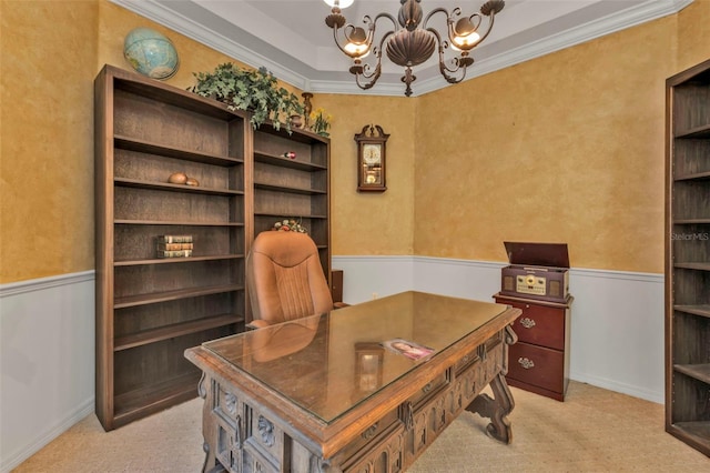 carpeted office space featuring ornamental molding and a notable chandelier