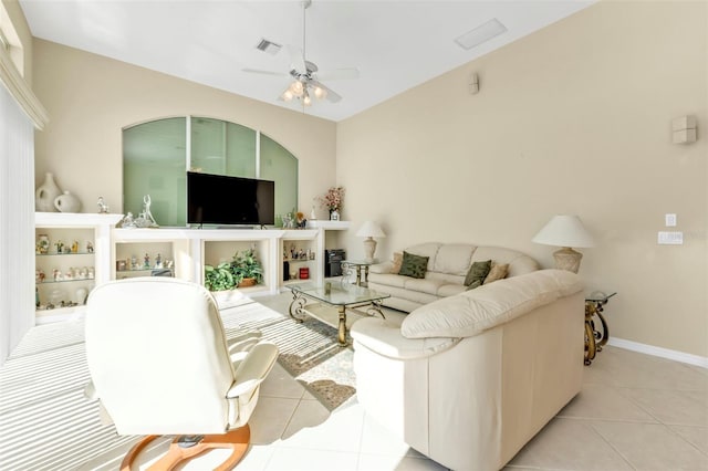 living room with light tile patterned floors and ceiling fan