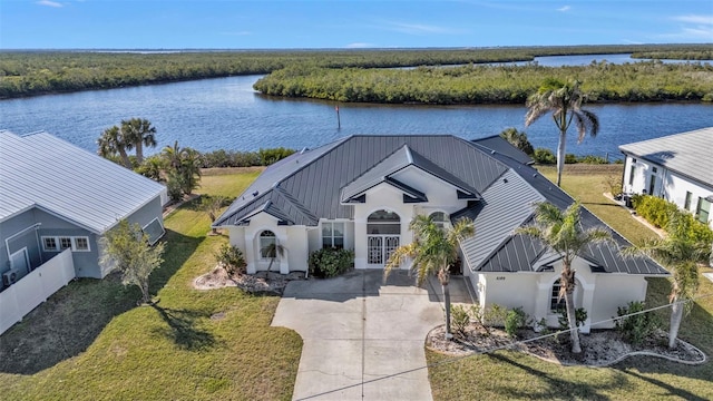 drone / aerial view with a water view