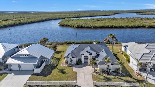 drone / aerial view with a water view