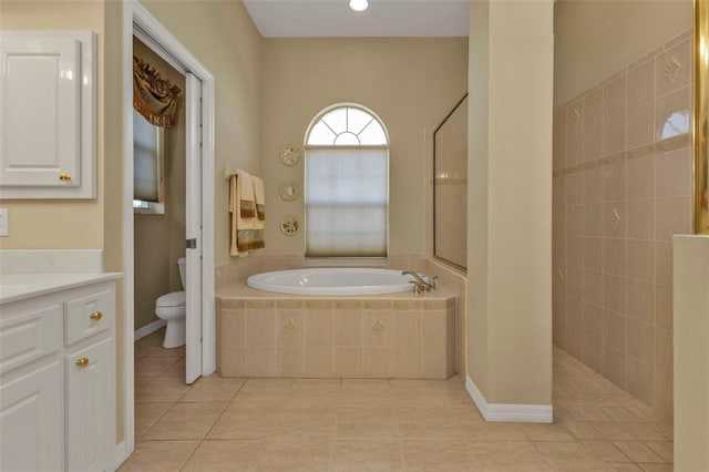 full bathroom with tile patterned floors, toilet, independent shower and bath, and vanity