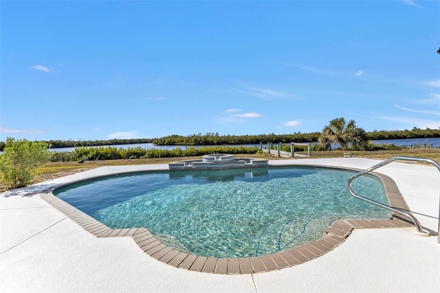 view of pool with a water view and an in ground hot tub