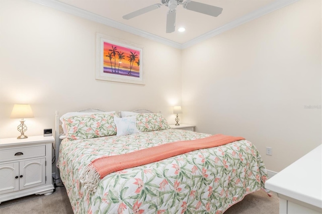 carpeted bedroom with crown molding and ceiling fan