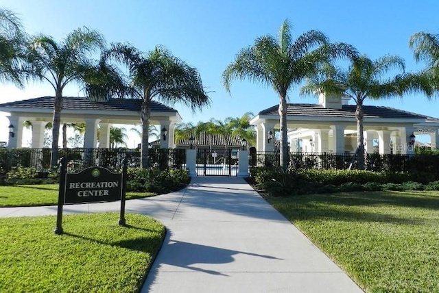 view of property's community with a gazebo and a lawn