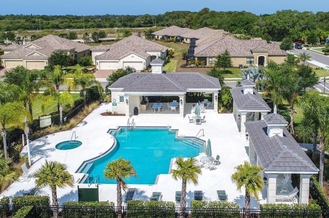 view of swimming pool with a gazebo and a patio area