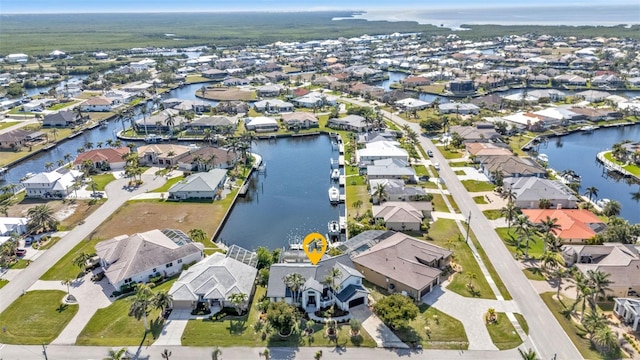 bird's eye view with a water view