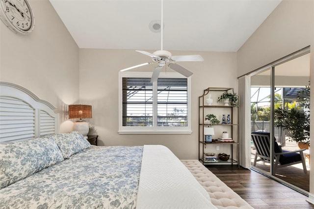 bedroom with ceiling fan, lofted ceiling, access to exterior, and dark hardwood / wood-style flooring