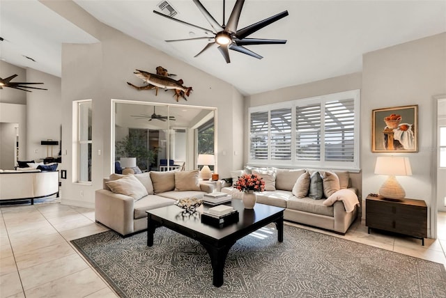 tiled living room with lofted ceiling, a healthy amount of sunlight, and ceiling fan