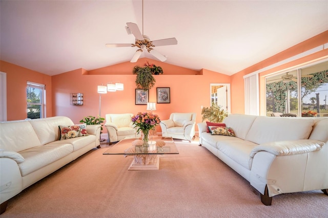 living room featuring lofted ceiling, carpet, and ceiling fan