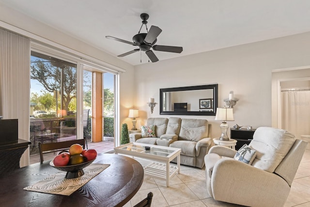 living room featuring light tile patterned flooring and ceiling fan