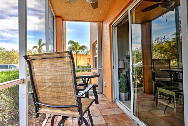 balcony featuring ceiling fan