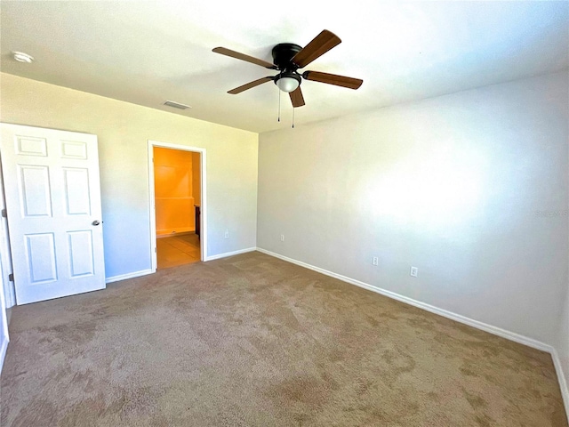 unfurnished bedroom with carpet flooring and ceiling fan