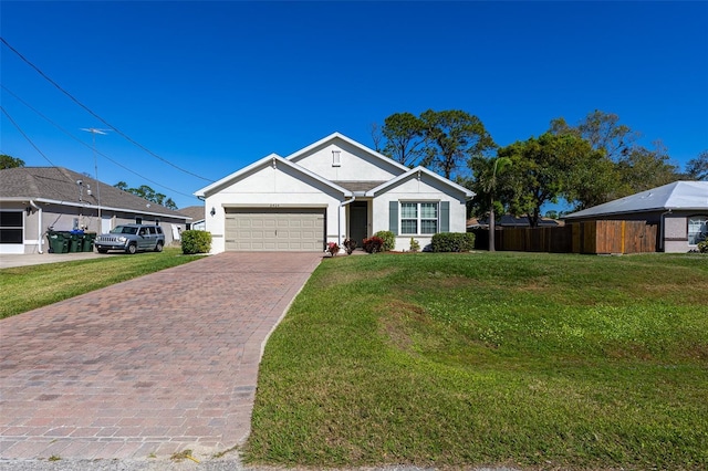 single story home with a front yard and a garage