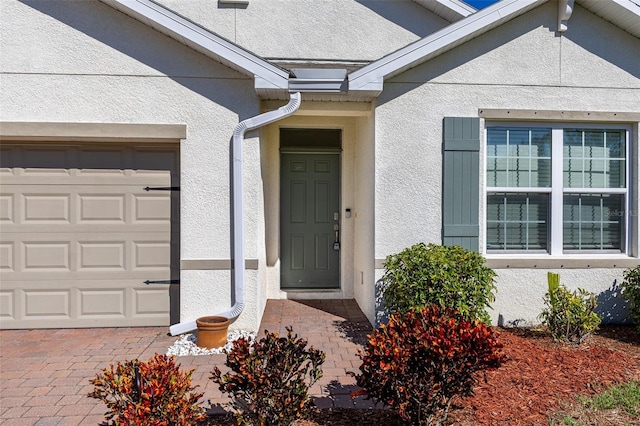 property entrance featuring a garage