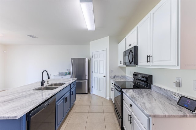 kitchen featuring sink, white cabinets, blue cabinetry, and black appliances