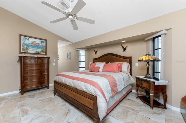 bedroom with vaulted ceiling and ceiling fan