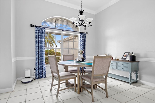 tiled dining area featuring ornamental molding and a notable chandelier