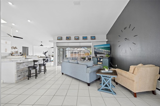 living room featuring light tile patterned flooring