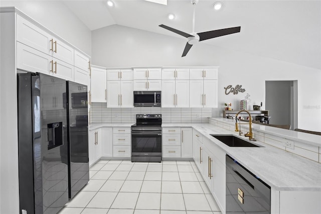 kitchen with white cabinetry, sink, kitchen peninsula, and appliances with stainless steel finishes