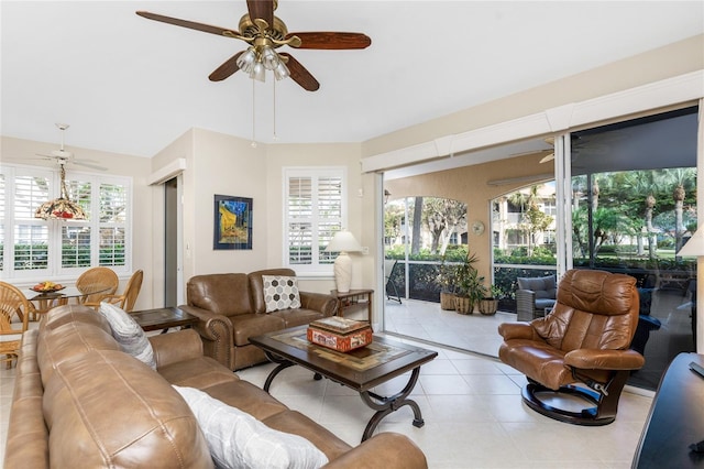 sunroom featuring ceiling fan