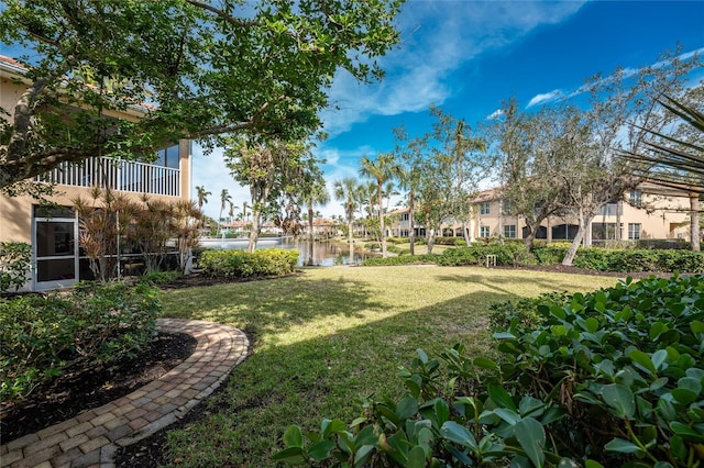 view of yard featuring a water view