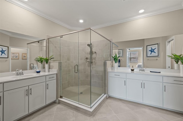 bathroom featuring ornamental molding, tile patterned flooring, and vanity