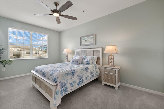 bedroom with ceiling fan and carpet flooring