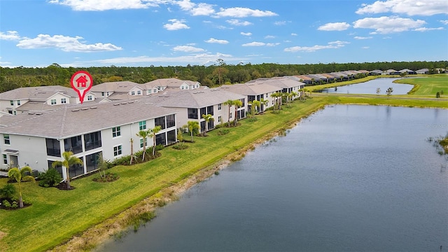 birds eye view of property featuring a water view