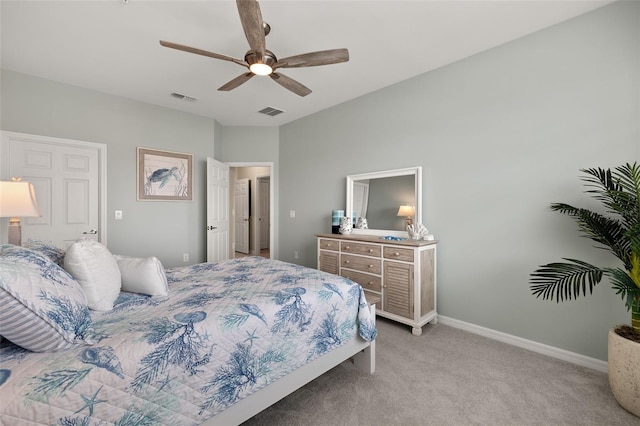 bedroom with light colored carpet and ceiling fan