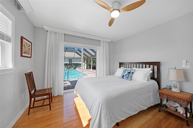 bedroom featuring light wood-type flooring, access to exterior, and ceiling fan