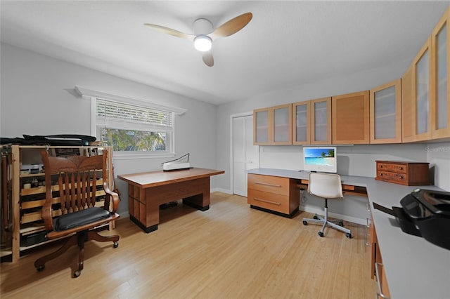 office area with ceiling fan and light wood-type flooring