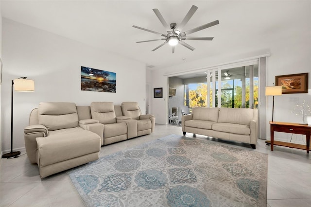 living room featuring ceiling fan and light tile patterned flooring