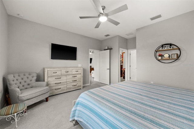 bedroom with light colored carpet and ceiling fan