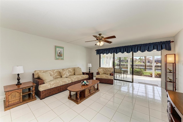 living room with light tile patterned floors and ceiling fan