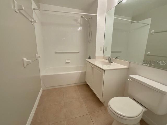 full bathroom featuring tile patterned flooring, vanity, washtub / shower combination, and toilet