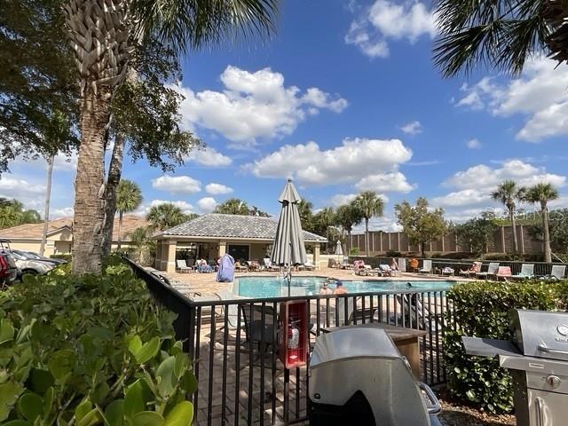 view of swimming pool with a patio area