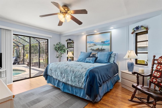 bedroom featuring hardwood / wood-style floors, crown molding, access to outside, and ceiling fan