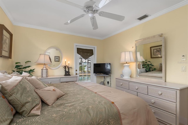 bedroom with ornamental molding and ceiling fan