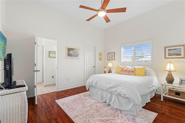 bedroom featuring dark wood-type flooring and ceiling fan