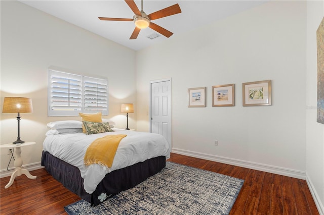 bedroom featuring dark wood-type flooring and ceiling fan