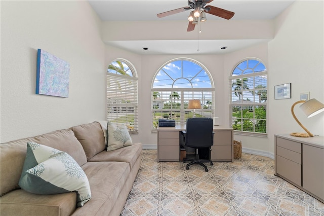 office space with ceiling fan