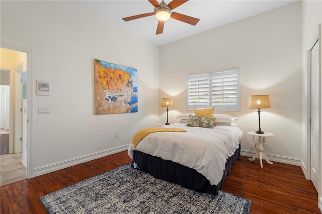 bedroom featuring dark wood-type flooring and ceiling fan