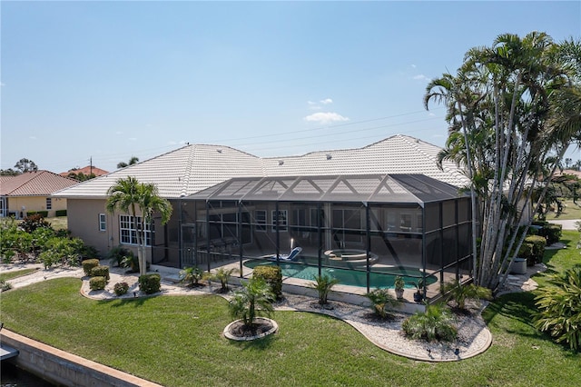 view of pool featuring a lanai, a yard, and a patio area