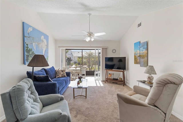 living room with light carpet, a textured ceiling, vaulted ceiling, and ceiling fan